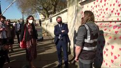 UK: Bereaved families paint mural of almost 150,000 red hearts to represent Covid-19 victims News Clip