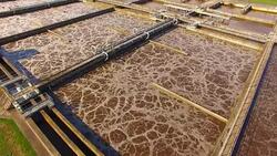 Aerial view to sewage treatment plant. Grey water recycling. Waste management theme. Stock Footage