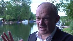 Ed Davey answers questions after doing a stand up paddleboarding yoga session News Clip