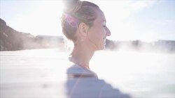 Young couple kissing in hot spa thermal pool in Iceland Stock Footage