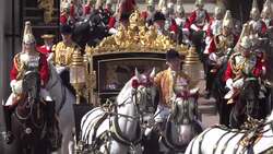 King and Queen travel from Buckingham Palace to Westminster for State Opening of Parliament News Clip