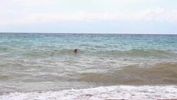 a man swimming in the sea Stock Footage