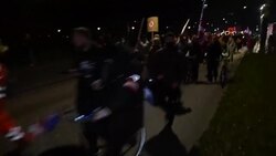 CLEAN : 'Men in Black' hold anti-vaccination demonstration in Copenhagen News Clip