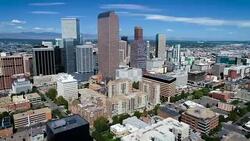 Backing away from Downtown Skyline Cityscape of Denver , Colorado , USA aerial drone view Stock Footage