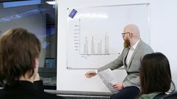 Man presenting data in chart Stock Footage