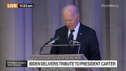 Biden Praises Character of Carter in Eulogy News Clip