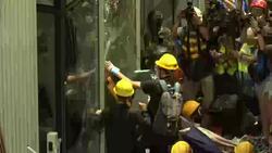 Protesters pour into Hong Kong legislature Instructional Video