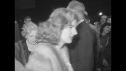 Elmira Theater grand reopening marquee at night, arrivals of celebrities and Corinne Calvet on stage in Elmira, NY News Clip