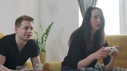 Young friend playing video game Stock Footage