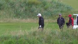 Donald Trump waves to cameras while golfing on private visit to Scotland News Clip