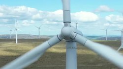 Aerial close up shot of Wind turbines on a wind farm... News Clip