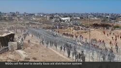 Palestinians caught between starvation and danger at aid sites News Clip