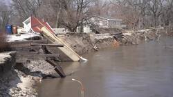 Residents pick up after floodwaters recede in Neb. Instructional Video