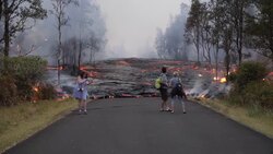 Residents watch as lava engulfs road after Kilauea volcano eruption News Clip