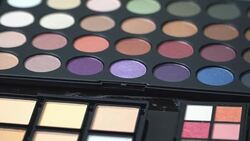 4k top view and turning of make-up palette. Stock Footage