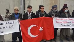 CLEAN : Afghans demand wages outside Turkish embassy in Kabul News Clip