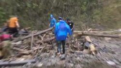 CLEAN : 'We may not find him alive': family and friends look for missing people after Colombia flooding News Clip