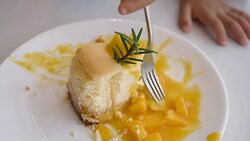 Eating Mango cheese cake. Stock Footage