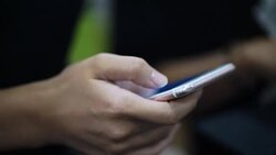 Young Businessman Using Smartphone Stock Footage