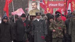 CLEAN : Russian communists lay flowers on Stalin's grave for his birthday anniversary News Clip