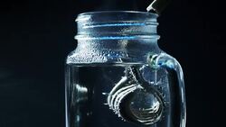 Boiling water with immersion heater Stock Footage