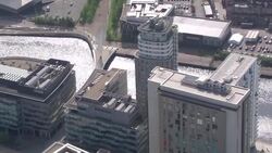 Aerials over Salford Quays and Manchester city centre News Clip