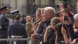UK: Crowds of people gather to line streets of London for the state funeral of Her Majesty Queen Elizabeth News Clip
