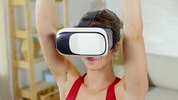 Woman Using VR while Exercising at Home Stock Footage