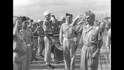 During war in Indochina (now Vietnam), captured French General Christian de Castries in Viet Tri after being freed by Indochinese Communists News Clip