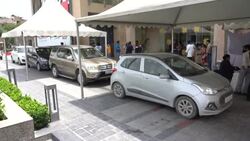 CLEAN : New Delhi residents receive Covid jabs at drive-through facility News Clip