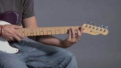 How to Play an F Minor Barre Chord on Guitar Instructional Video
