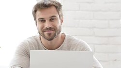 Smiling Man Looking at Camera at Work Stock Footage