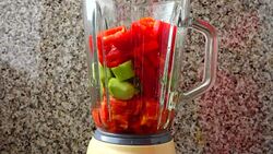 Filling in the blender of tomatoes, cucumbers and bulgarian pepper.	Preparation of Gazpacho in the blender. Stock Footage