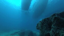 Annelida under the sea with Motorboats Silhouettes Stock Footage