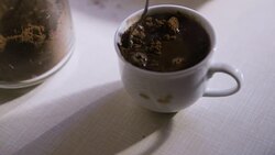 Steering fresh made cup of coffee Stock Footage