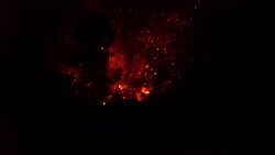 Huge Explosion Sends Volcanic Lava Bombs Flying Through Air At Night Stock Footage