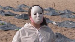 CLEAN : Brazilian activists protest on Copacabana beach, as Brazil surpasses 400,000 Covid-19 deaths News Clip