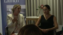 Meghan meets female entrepreneurs at Work in Progress, sits on floor with mothers and babies at Mothers2Mothers nonprofit News Clip