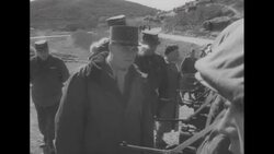 General Mark Clark gives French Marshal Alphonse Juin a tour of UN military base in Korea; reviews French soldiers News Clip
