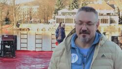 Hardy swimmers take a Christmas dip in Prague's Vlata river News Clip