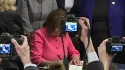 CLEAN : Pelosi signs Trump impeachment articles before transfer to Senate News Clip