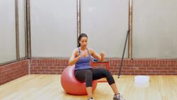 How to Do a Crunch with a Ball for Female Strength Training Instructional Video