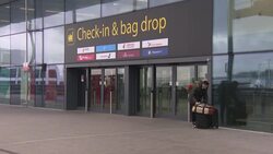 People at Gatwick airport with their suitcases News Clip