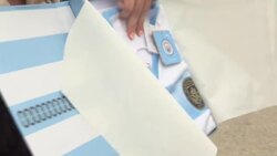 Manchester City fan holding a limited edition Sergio Aguero shirt News Clip