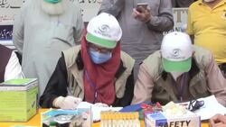 CLEAN : Health officials start drive-through screening and testing facility for COVID-19 in Islamabad News Clip