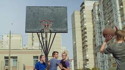 Streetball players jumping to take rebound on court Stock Footage