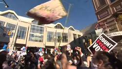 Philadelphia residents dancing in the streets, anticipating election results News Clip