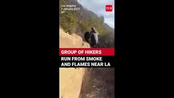 California Wildfires: Hikers Flee Los Angeles Wildfire As Flames And Smoke Chase Them | Watch News Clip