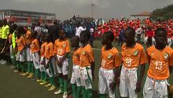 Macron meets Drogba at sporting event in Abidjan News Clip