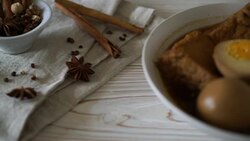 hard-boiled egg in brown sauce or sweet gravy sauce with tofu Stock Footage